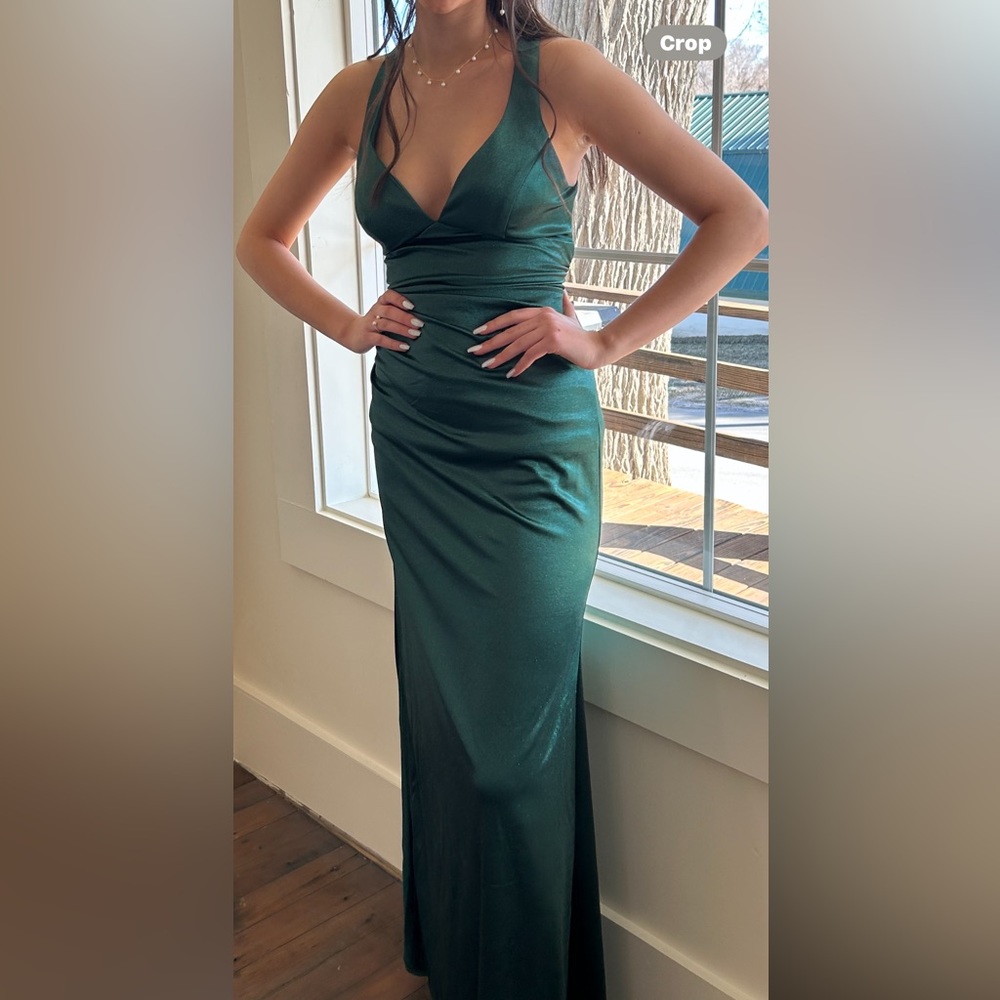 Beautiful Emerald green Prom dress. Worn one time. For reference model is 6 ft. - Picture 8 of 8